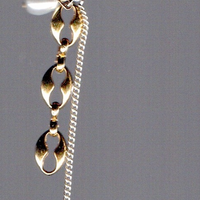 Boucle d'oreille upcyclée Lee