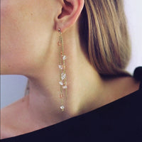 Boucles d’oreilles upcyclées pendantes ornées de cristaux