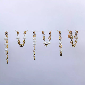 Photo sur fond blanc des six boucles d'oreilles faites main à l'atelier Tête d'Orange à Strasbourg.