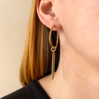 Upcycled hoop earrings decorated with a stone and a chain 