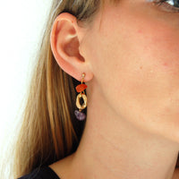 Earrings adorned with stones