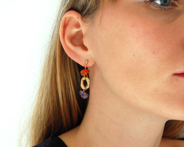 Earrings adorned with stones